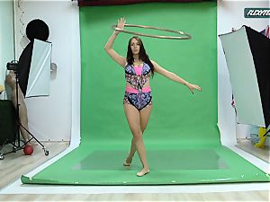 phat bosoms Nicole on the green screen stretching