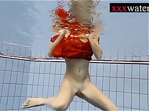 super-sexy steaming damsel swimming in the pool